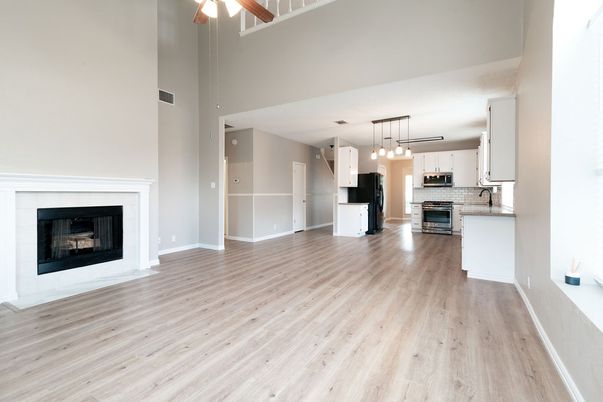 Empty room, Fireplace, Interior, Kitchen, Pendant Lights, Wood Texture Flooring