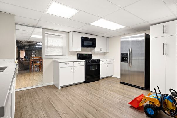 Dining room, Interior, Kitchen, Recessed Lighting, Stainless Steel Appliances, Wood Texture Flooring