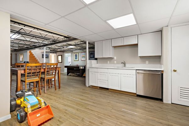 Dining room, Interior, Kitchen, Recessed Lighting, Stainless Steel Appliances, Wood Texture Flooring