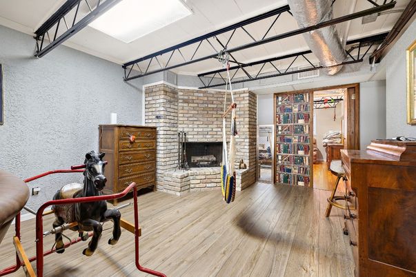 Fireplace, Fitness Equipment, Interior, Stone Walls, Wood Texture Flooring