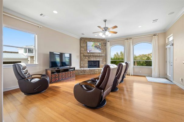 Fireplace, Interior, Living room, Recessed Lighting, Stone Walls, Wood Texture Flooring