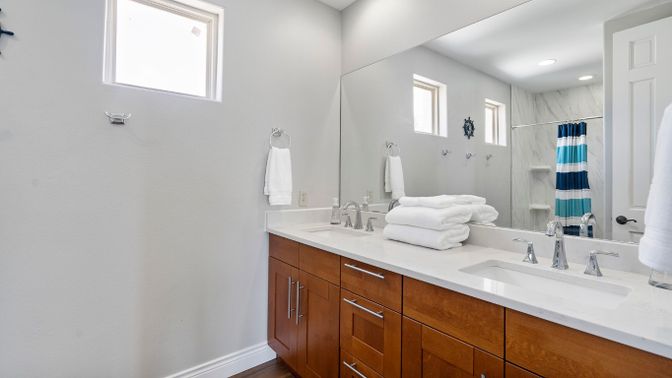 Bathroom, Dual Sink Vanities, Interior, Recessed Lighting, Wood Texture Flooring