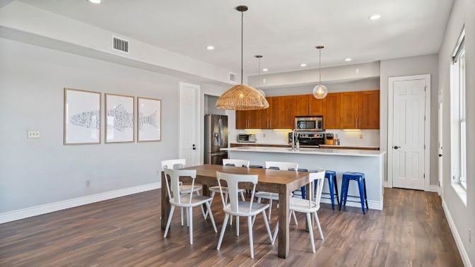Dining room, Interior, Kitchen, Pendant Lights, Recessed Lighting, Stainless Steel Appliances, Wood Texture Flooring