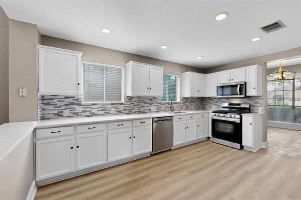Interior, Kitchen, Pendant Lights, Recessed Lighting, Stainless Steel Appliances, Wood Texture Flooring