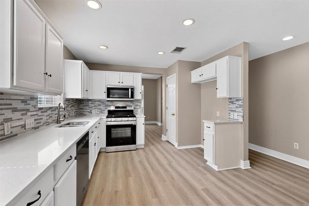Interior, Kitchen, Recessed Lighting, Stainless Steel Appliances, Wood Texture Flooring