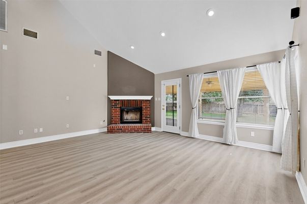 Empty room, Fireplace, Interior, Recessed Lighting, Wood Texture Flooring
