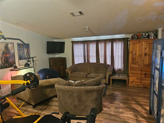 Fireplace, Fitness Equipment, Interior, Living room, Wood Texture Flooring