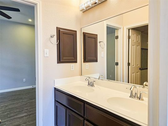 Bathroom, Dual Sink Vanities, Interior, Recessed Lighting, Wood Texture Flooring