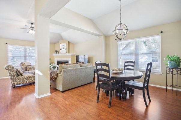 Chandelier, Dining room, Fireplace, Interior, Living room, Pendant Lights, Wood Texture Flooring