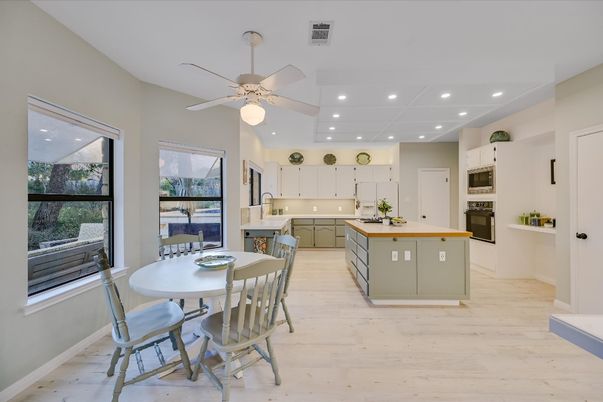 Dining room, Interior, Kitchen, Recessed Lighting, Stainless Steel Appliances, Wood Texture Flooring