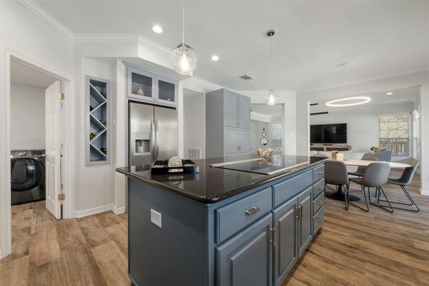 Dining room, Interior, Kitchen, Pendant Lights, Recessed Lighting, Stainless Steel Appliances, Wood Texture Flooring