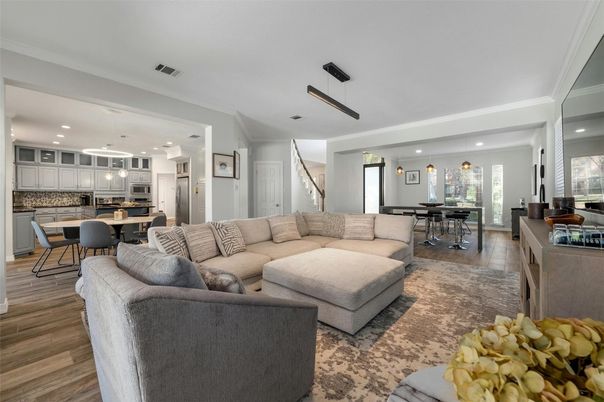 Dining room, Interior, Kitchen, Living room, Pendant Lights, Recessed Lighting, Stainless Steel Appliances, Wood Texture Flooring