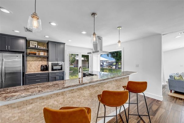 Interior, Kitchen, Pendant Lights, Recessed Lighting, Stainless Steel Appliances, Wood Texture Flooring