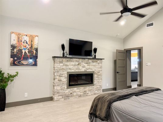 Bedroom, Fireplace, Interior, Recessed Lighting, Wood Texture Flooring