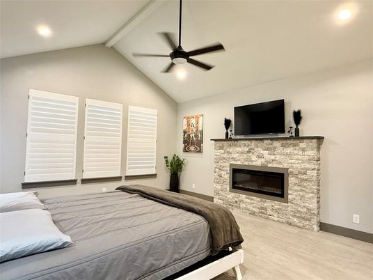 Bedroom, Fireplace, Interior, Recessed Lighting, Wood Texture Flooring