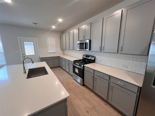 Interior, Kitchen, Recessed Lighting, Stainless Steel Appliances, Wood Texture Flooring