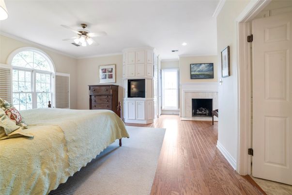 Bedroom, Fireplace, Interior, Recessed Lighting, Wood Texture Flooring