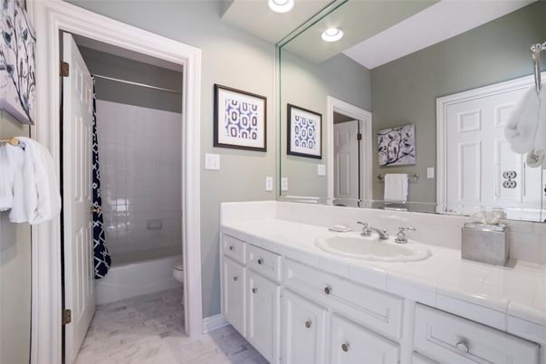 Bathroom, Dual Sink Vanities, Interior, Marble, Recessed Lighting, Tile Countertops
