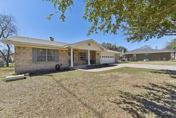 Attached, Backyard, Exterior, Facade, Brick Facade, Ranch