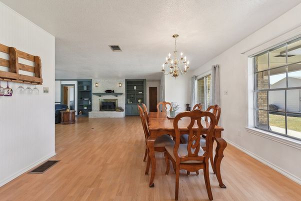 Chandelier, Dining room, Fireplace, Interior, Pendant Lights, Wood Texture Flooring