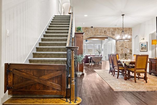 Chandelier, Dining room, Interior, Pendant Lights, Recessed Lighting, Stone Walls, Wood Texture Flooring