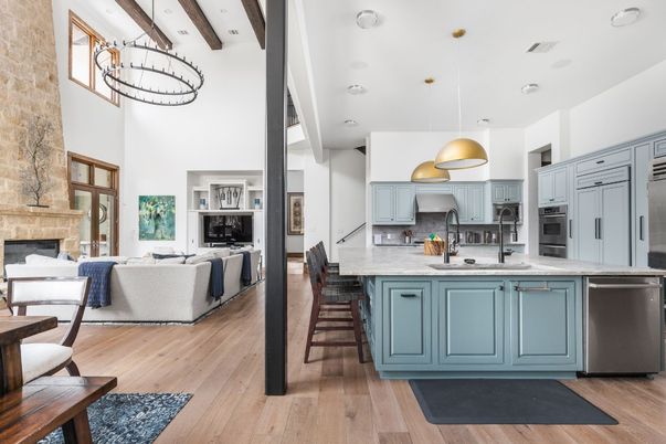 Fireplace, Interior, Kitchen, Living room, Pendant Lights, Recessed Lighting, Stainless Steel Appliances, Wood Texture Flooring