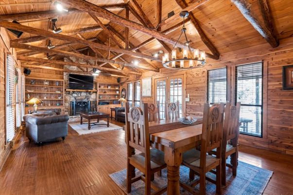 Chandelier, Dining room, Fireplace, Interior, Living room, Wooden Beams, Wooden Ceilings, Wood Texture Flooring, Wooden Walls