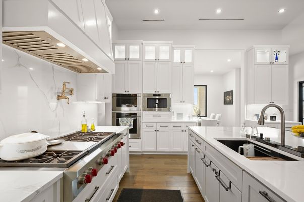 Interior, Kitchen, Marble Walls, Recessed Lighting, Stainless Steel Appliances, Wood Texture Flooring