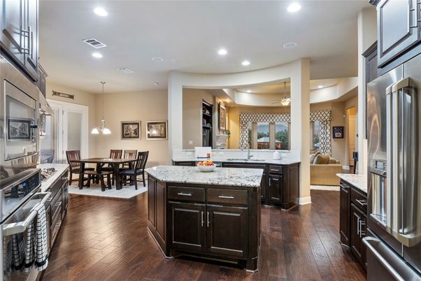 Dining room, Interior, Kitchen, Pendant Lights, Recessed Lighting, Stainless Steel Appliances, Wood Texture Flooring