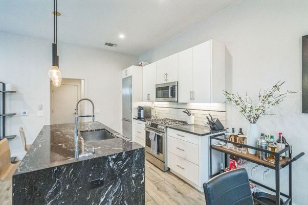 Interior, Kitchen, Pendant Lights, Recessed Lighting, Stainless Steel Appliances, Wood Texture Flooring