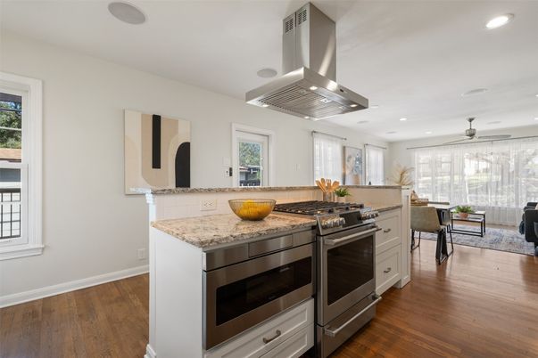 Dining room, Interior, Kitchen, Recessed Lighting, Stainless Steel Appliances, Wood Texture Flooring