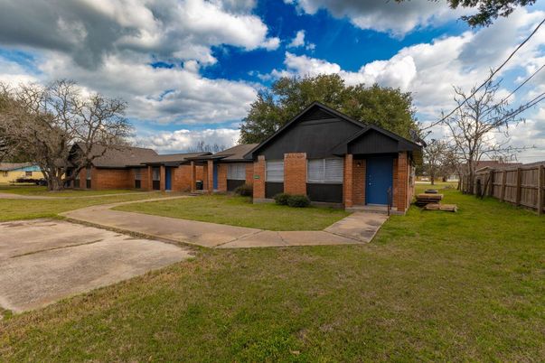 Attached, Backyard, Exterior, Facade, Brick Facade, Ranch