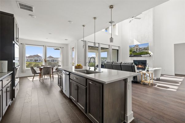 Dining room, Fireplace, Interior, Kitchen, Living room, Pendant Lights, Recessed Lighting, Wood Texture Flooring