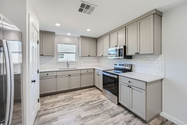 Interior, Kitchen, Recessed Lighting, Stainless Steel Appliances, Wood Texture Flooring
