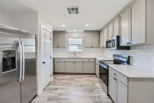 Interior, Kitchen, Recessed Lighting, Stainless Steel Appliances, Wood Texture Flooring