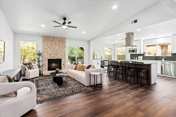 Fireplace, Interior, Kitchen, Living room, Recessed Lighting, Stone Walls, Wood Texture Flooring