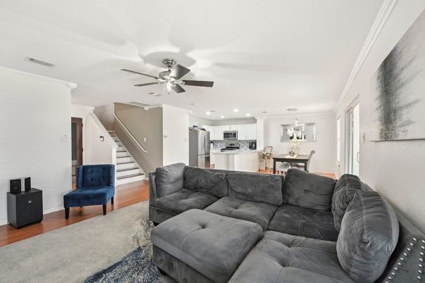 Dining room, Interior, Kitchen, Living room, Recessed Lighting, Stainless Steel Appliances, Wood Texture Flooring