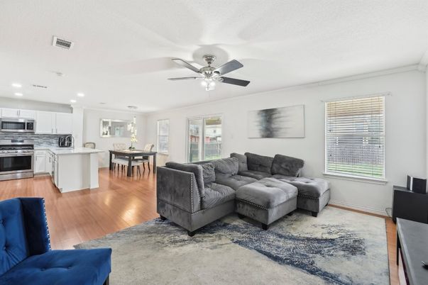 Dining room, Interior, Kitchen, Living room, Pendant Lights, Recessed Lighting, Stainless Steel Appliances, Wood Texture Flooring