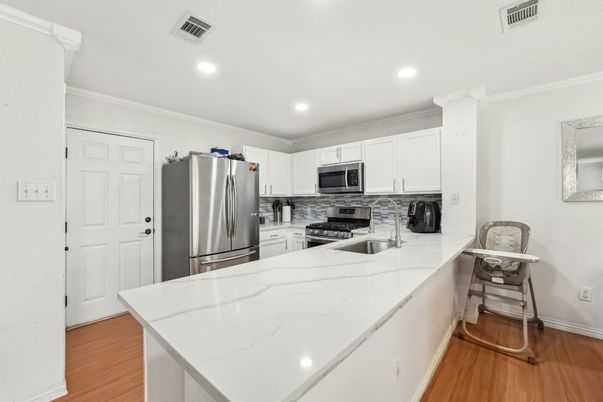 Interior, Kitchen, Recessed Lighting, Stainless Steel Appliances, Wood Texture Flooring