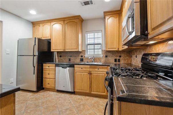 Interior, Kitchen, Recessed Lighting, Tile Countertops