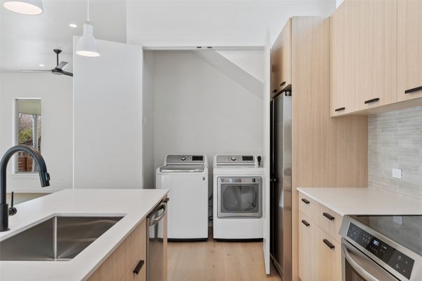 Interior, Kitchen, Recessed Lighting, Washer, Wood Texture Flooring