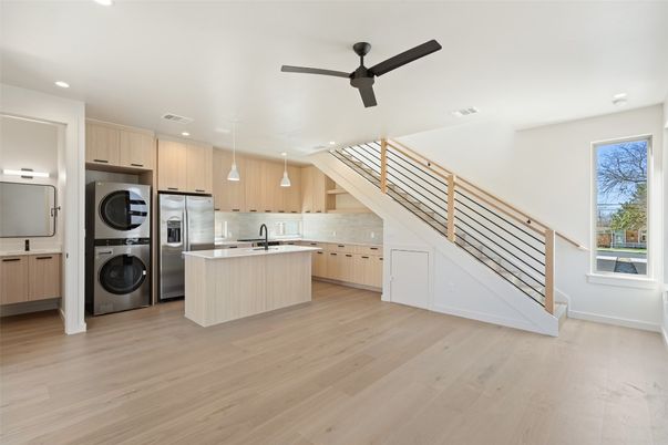 Interior, Kitchen, Recessed Lighting, Stainless Steel Appliances, Washer, Wood Texture Flooring