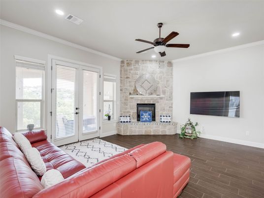Fireplace, Interior, Living room, Recessed Lighting, Stone Walls, Wood Texture Flooring