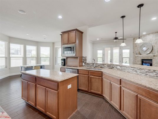 Fireplace, Interior, Kitchen, Pendant Lights, Recessed Lighting, Stone Walls, Wood Texture Flooring