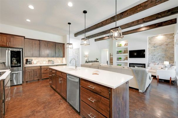Fireplace, Interior, Kitchen, Living room, Pendant Lights, Recessed Lighting, Stainless Steel Appliances, Stone Walls, Wooden Beams, Wood Texture Flooring