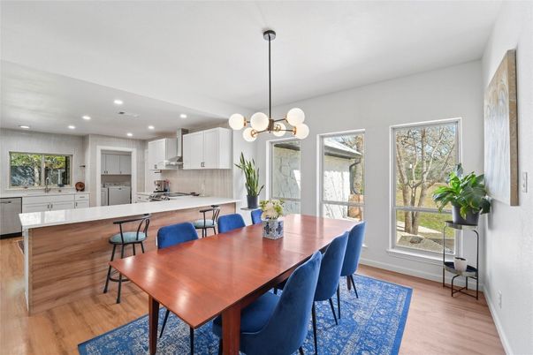 Dining room, Interior, Kitchen, Pendant Lights, Recessed Lighting, Stainless Steel Appliances, Wood Texture Flooring