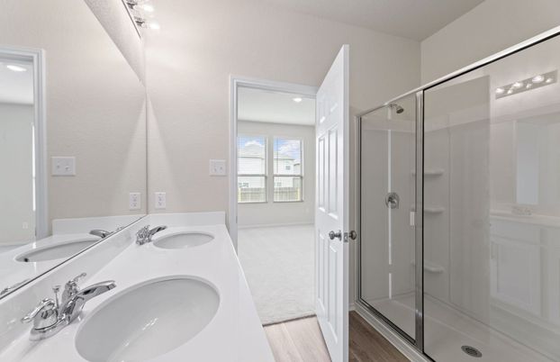 Bathroom, Dual Sink Vanities, Glass Shower, Interior, Recessed Lighting, Wood Texture Flooring