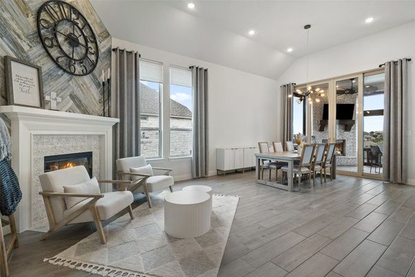 Dining room, Fireplace, Interior, Living room, Pendant Lights, Recessed Lighting, Wood Texture Flooring
