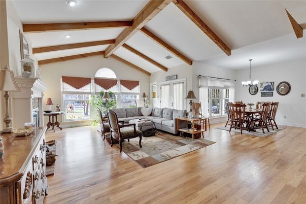 Chandelier, Dining room, Fireplace, Interior, Living room, Recessed Lighting, Wooden Beams, Wood Texture Flooring