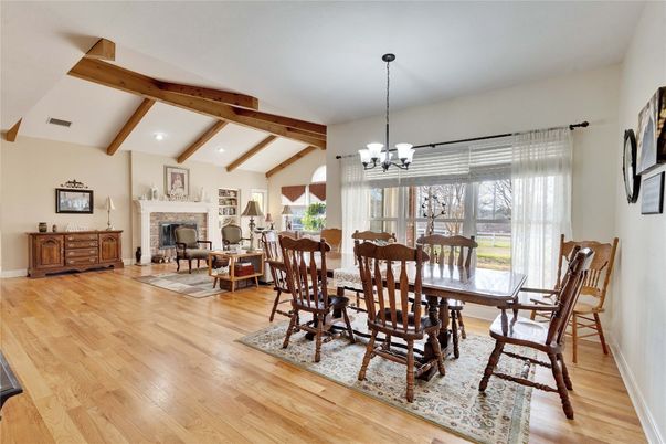Chandelier, Dining room, Fireplace, Interior, Recessed Lighting, Wooden Beams, Wood Texture Flooring